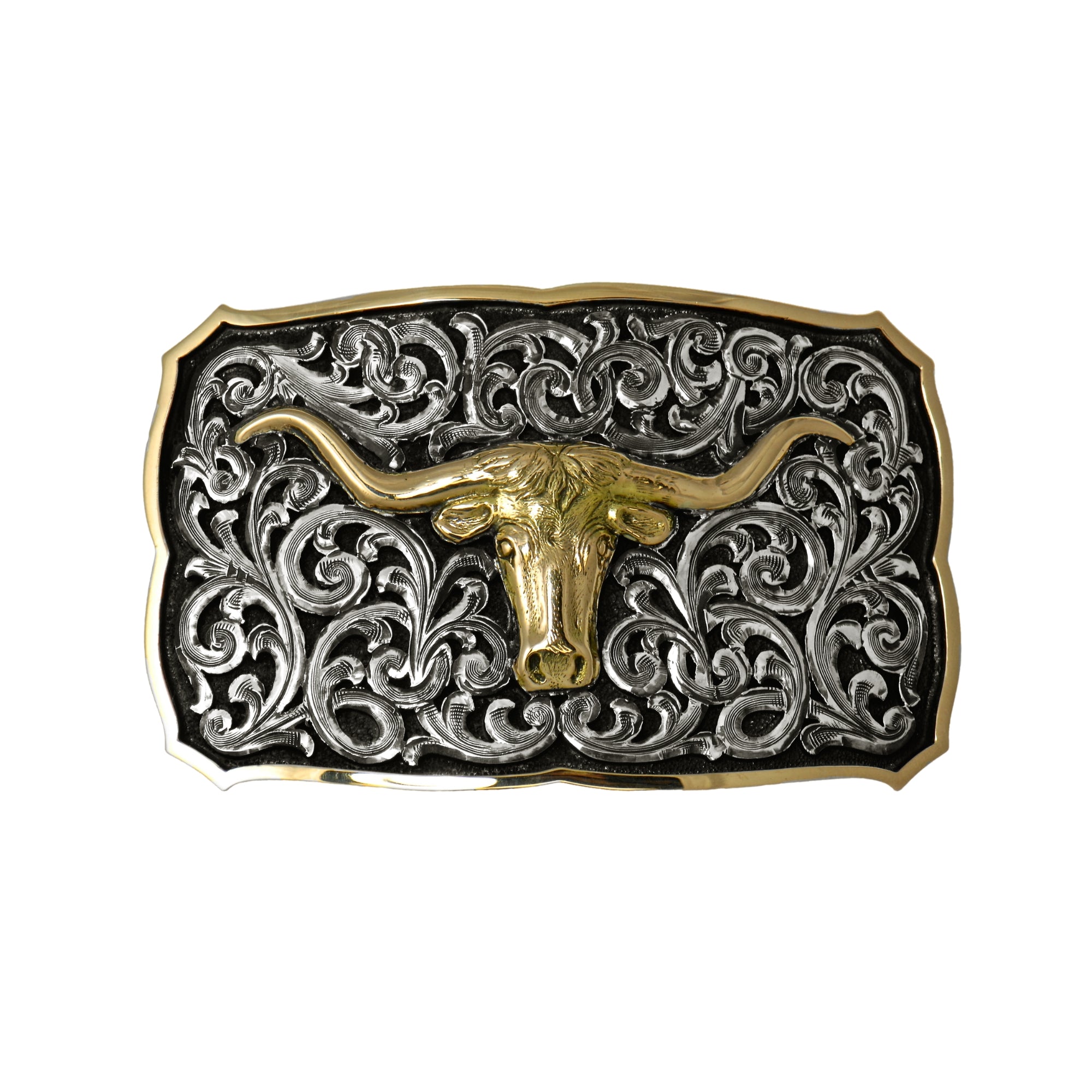 A western-style belt buckle featuring a raised longhorn steer head in 14kt gold with filigree silver scrolls and a raised 14kt yellow gold border.