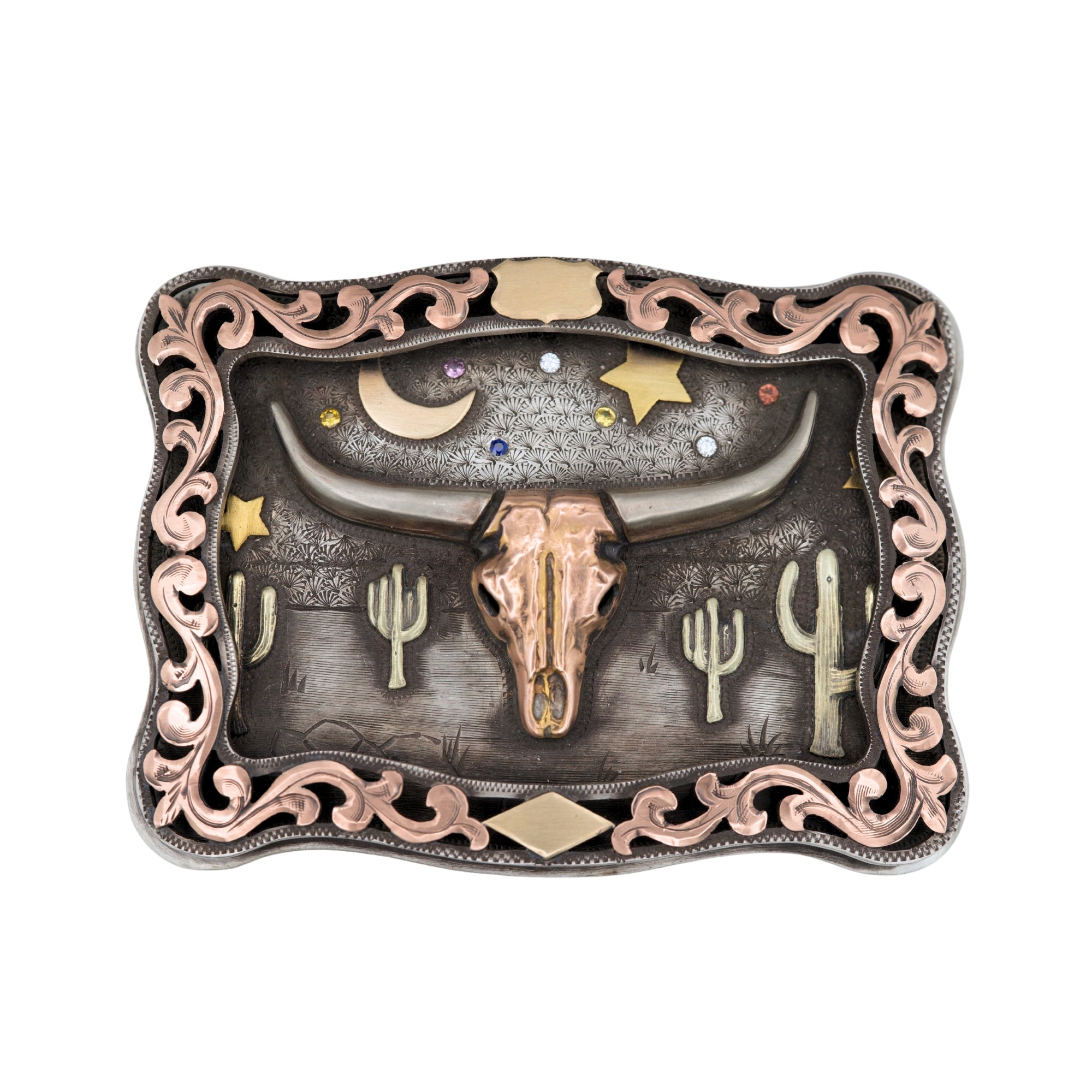 Decorative Bohlin belt buckle with longhorn skull, stars, and cacti design on an engraved background. The sky is set with multi-colored sapphires