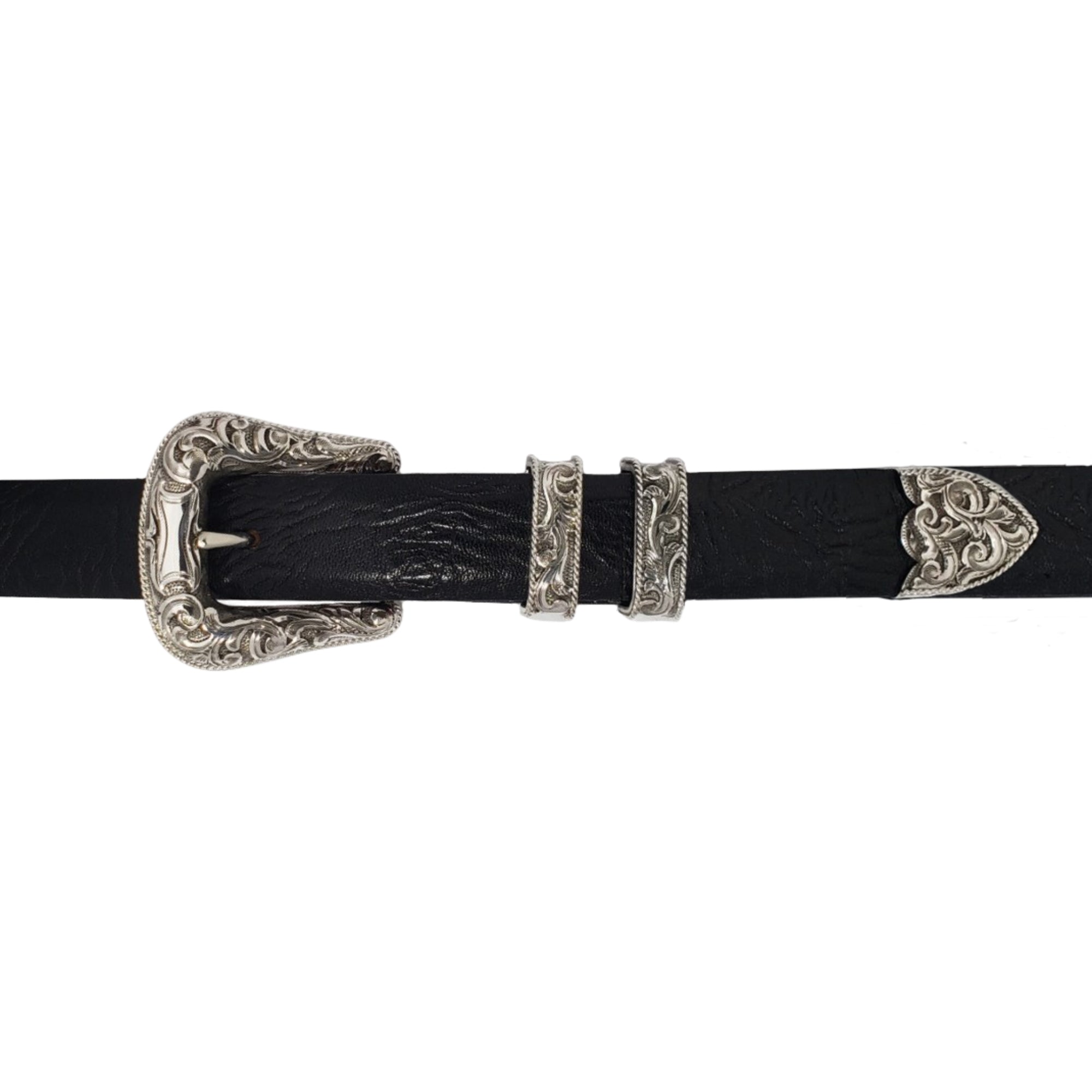 A black leather belt with hand filigree scrolls and rope edge on buckle, keeper rings, and a tip, shown against a plain white background.