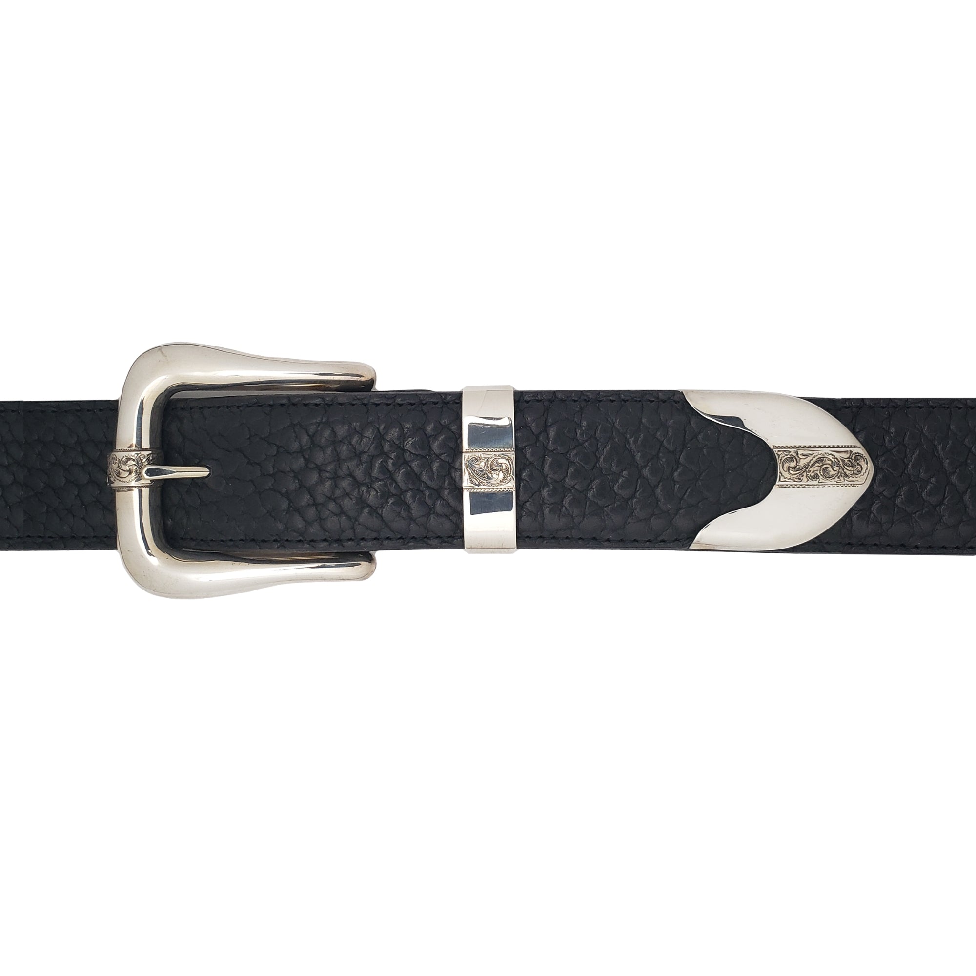 A close-up of a black textured leather belt with polished silver-tone metal hardware, including a buckle, keeper, and decorative tip, shown against a plain white background.