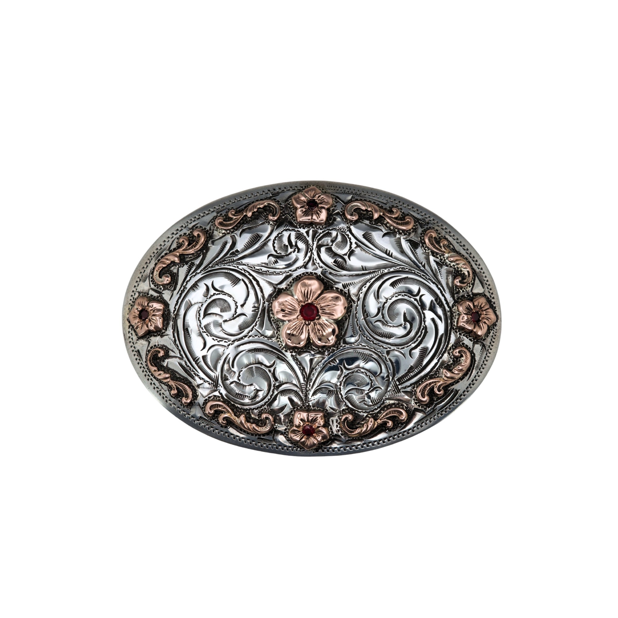 An oval silver belt buckle featuring intricate engraving with Rose gold flowers and rose gold scrolls and Rubies.