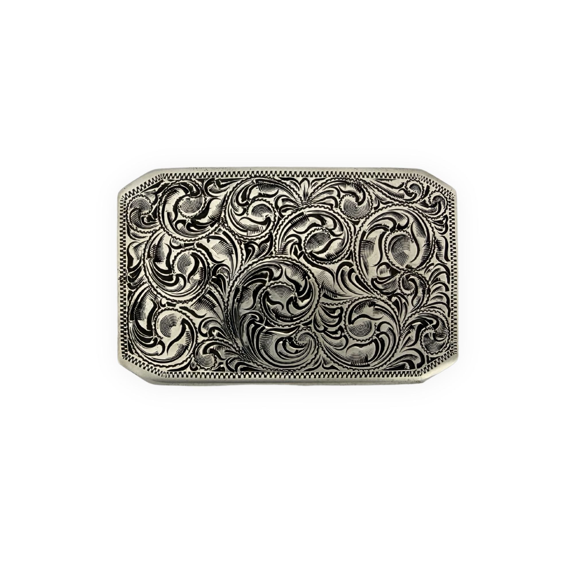 Decorative silver belt buckle on a white background