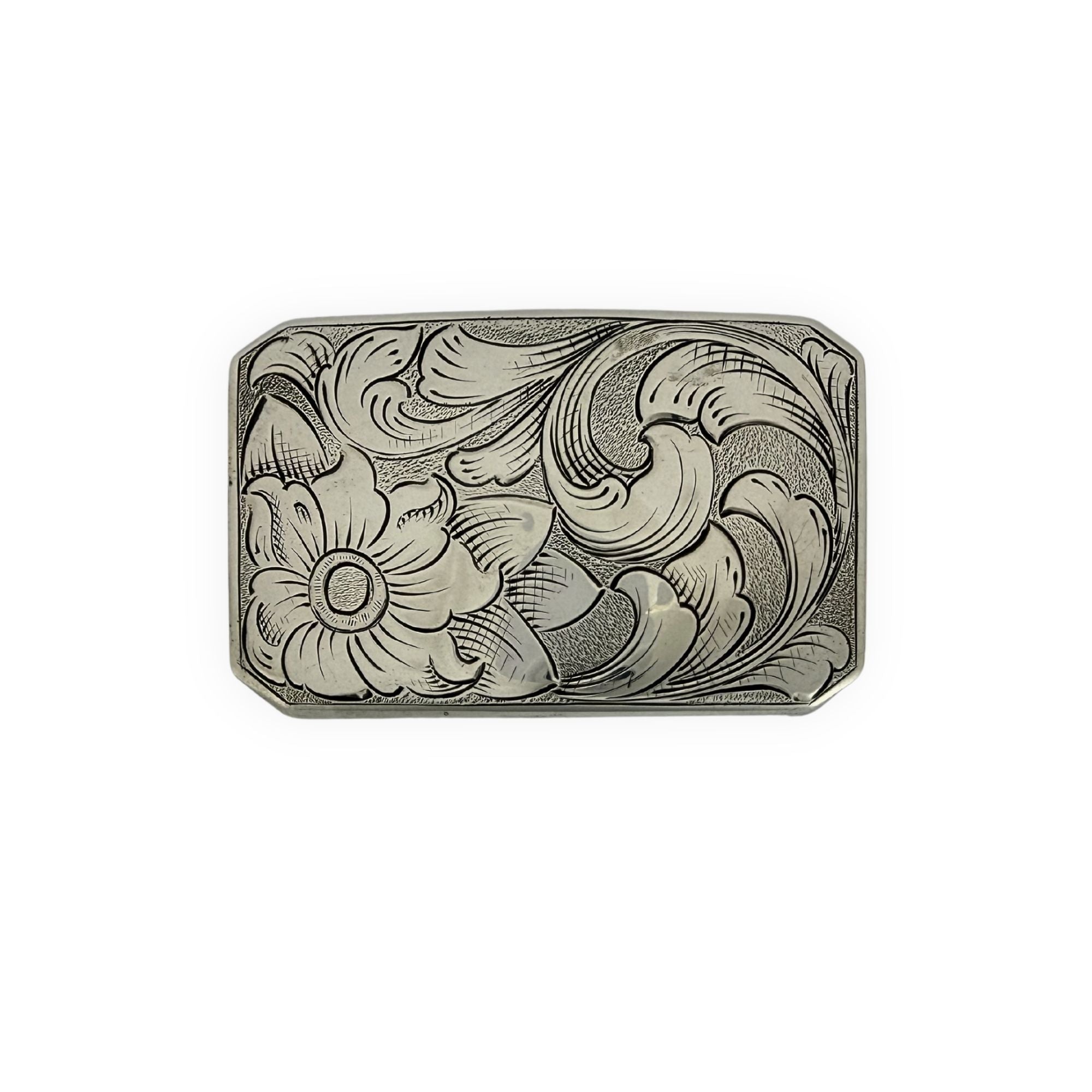 Decorative metal belt buckle with floral patterns on a white background