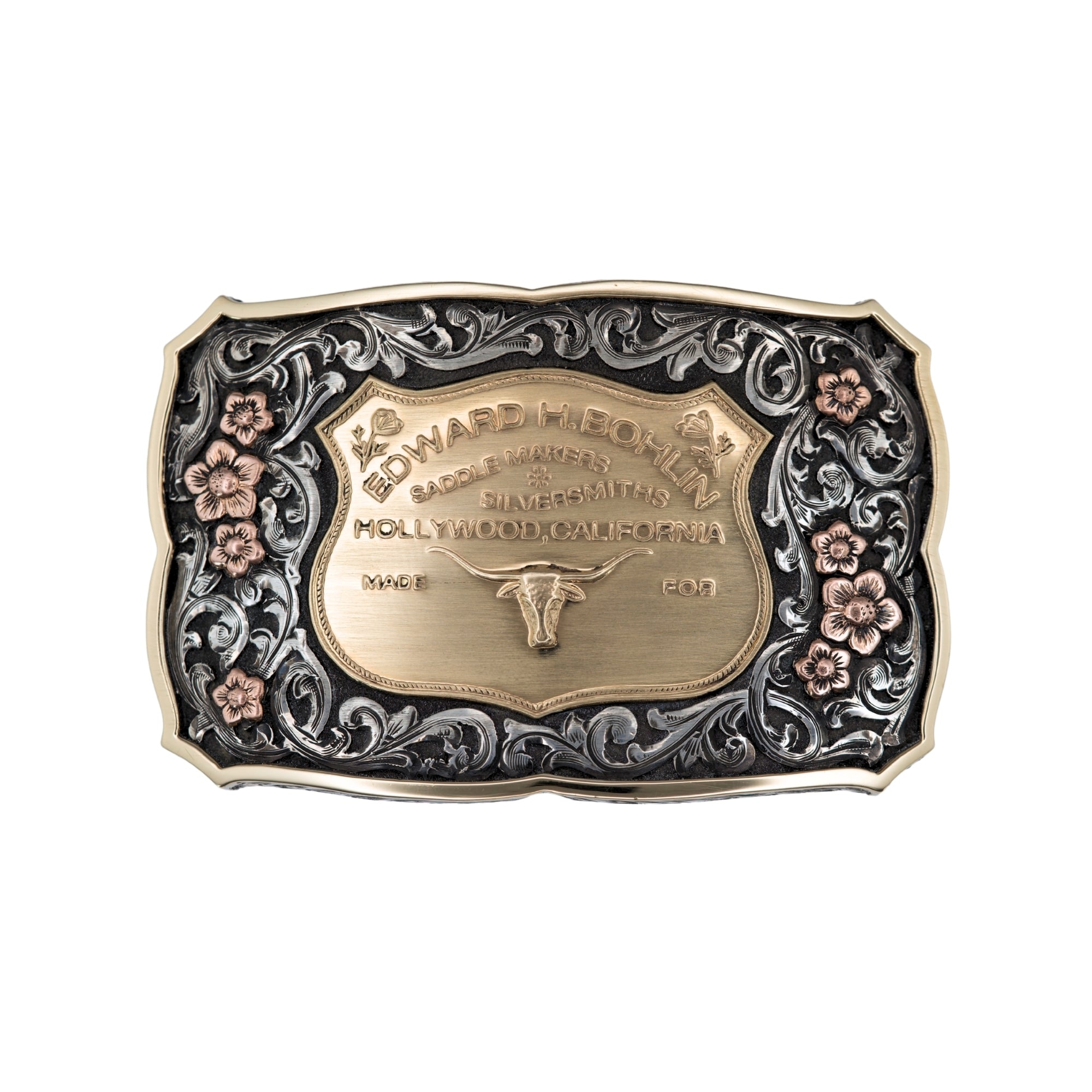 Scalloped silver belt buckle with hand filigree scrolls rose gold flowers and a 14kt yellow gold seatplate in the center. The buckle has a yellow gold border 