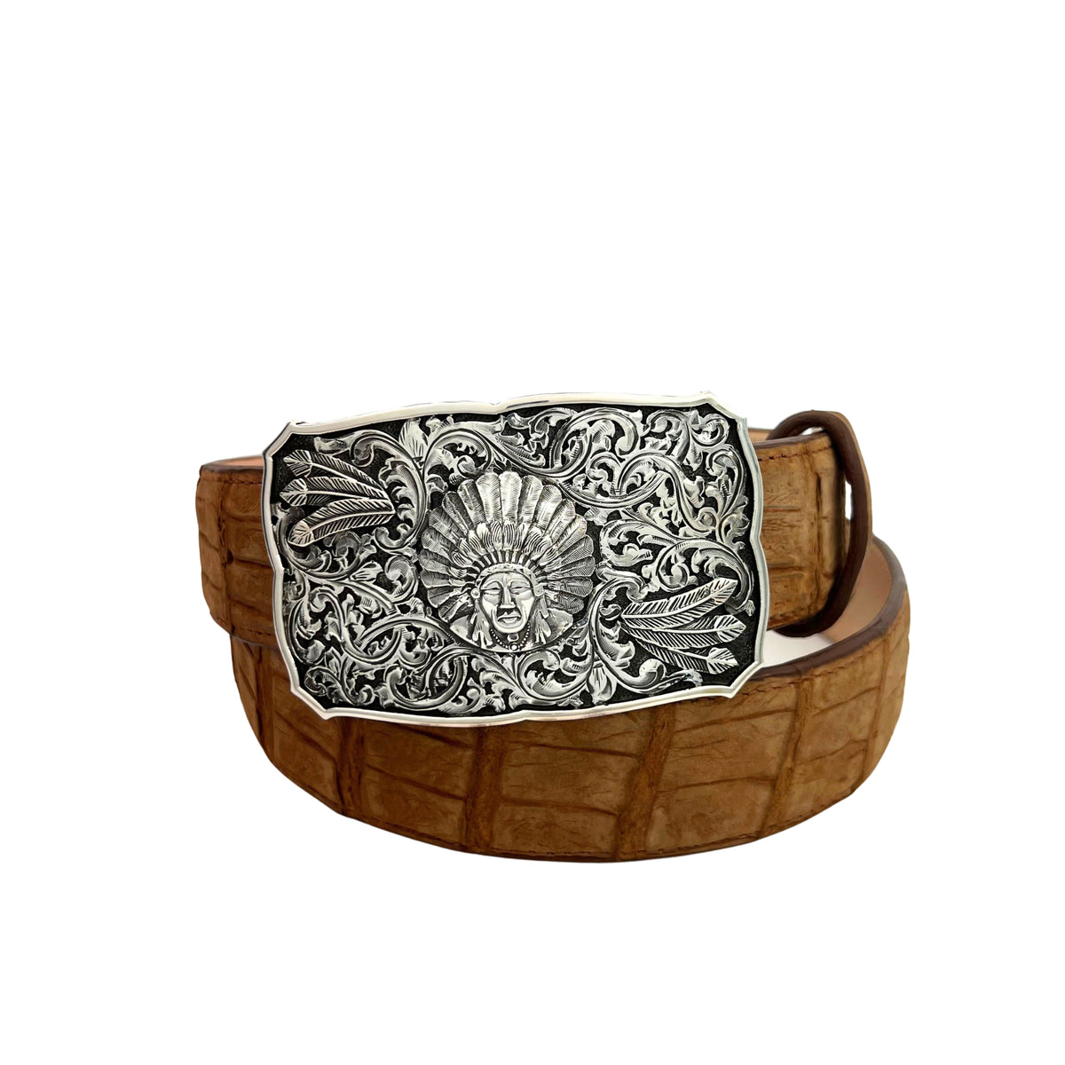 Bohlin 766 Chief Red Wolf sterling silver buckle displayed on a Western leather belt, featuring raised scrollwork, feather overlays, and a silver border.
