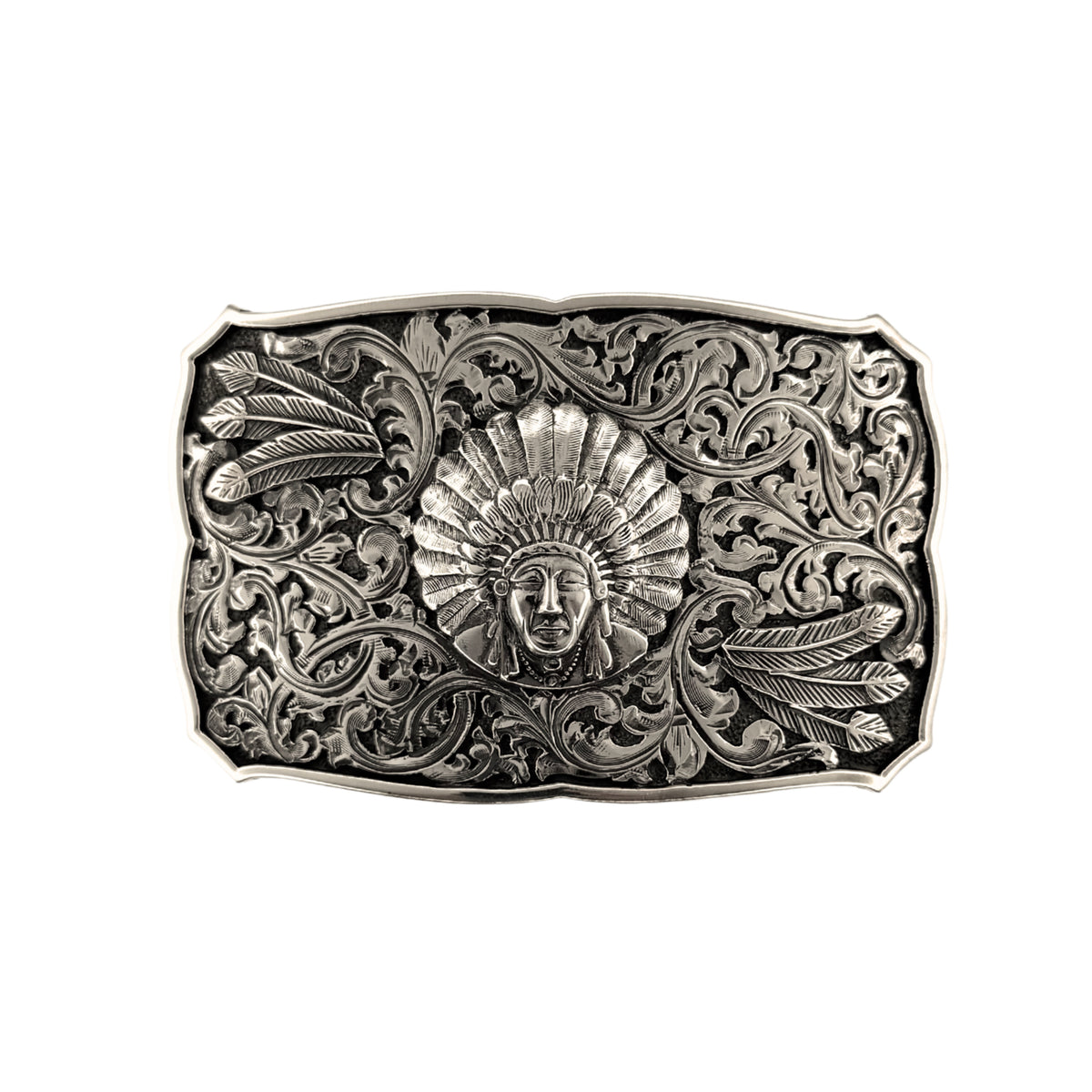 Bohlin 766 Chief Red Wolf sterling silver belt buckle featuring a raised Indian chief portrait, heavy-gauge scrollwork, six feather overlays, and a raised silver border.