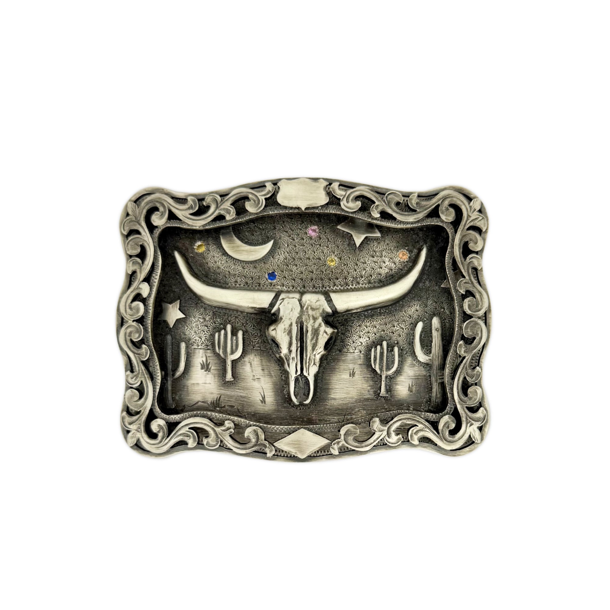 Sterling silver Bohlin belt buckle with raised filigree border, Longhorn skull stars and moon. With an Arizona landscape.