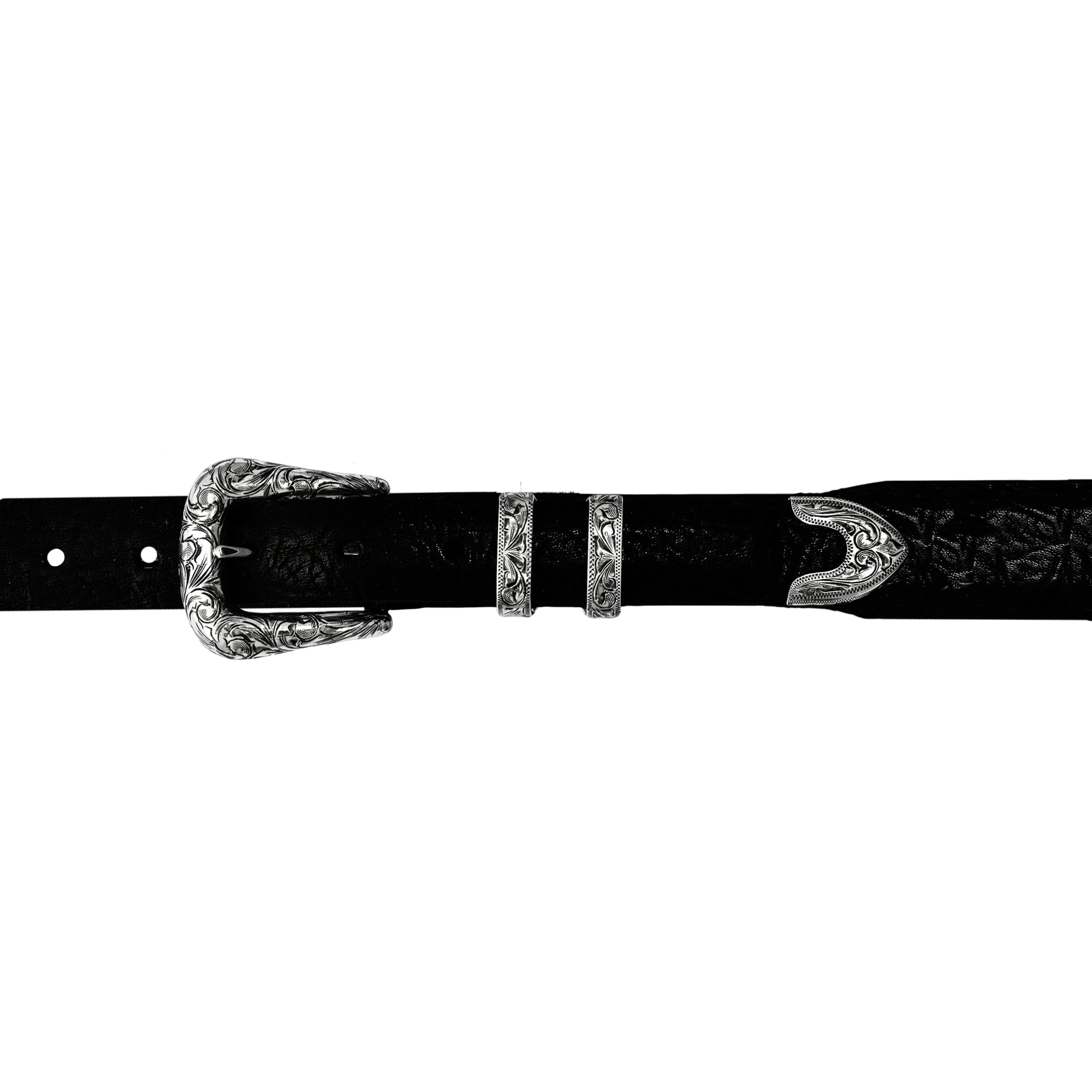 A black textured leather belt with ornate  fully hand engraved buckle, keeper, and tip, shown against a plain white background.
