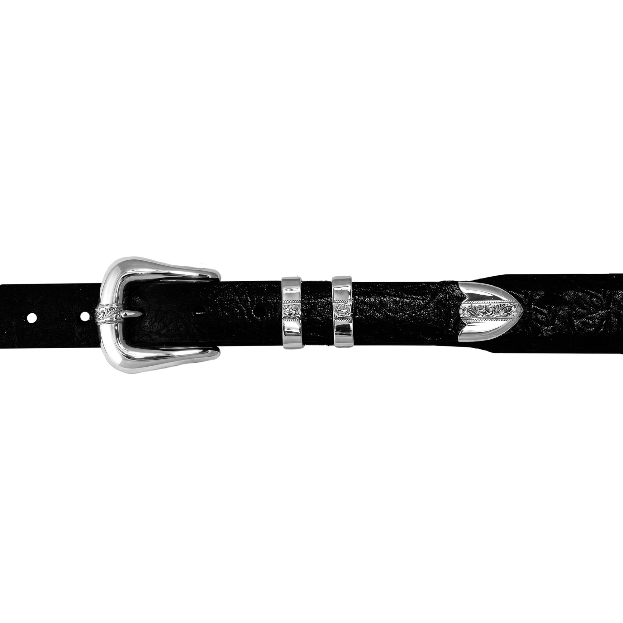 A close-up of a black textured leather belt with a single overlaid sterling silver stripe with traditional rodeo engraving.