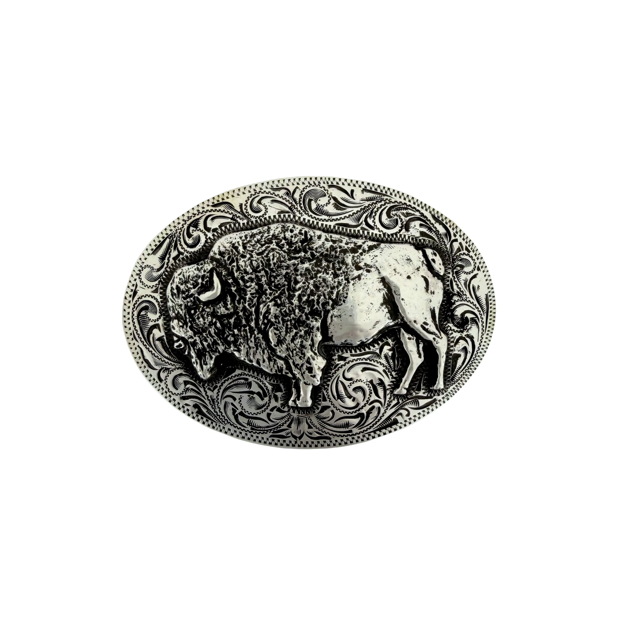 An oval sterling silver belt buckle featuring a raised Buffalo with rodeo style engraving around it. 