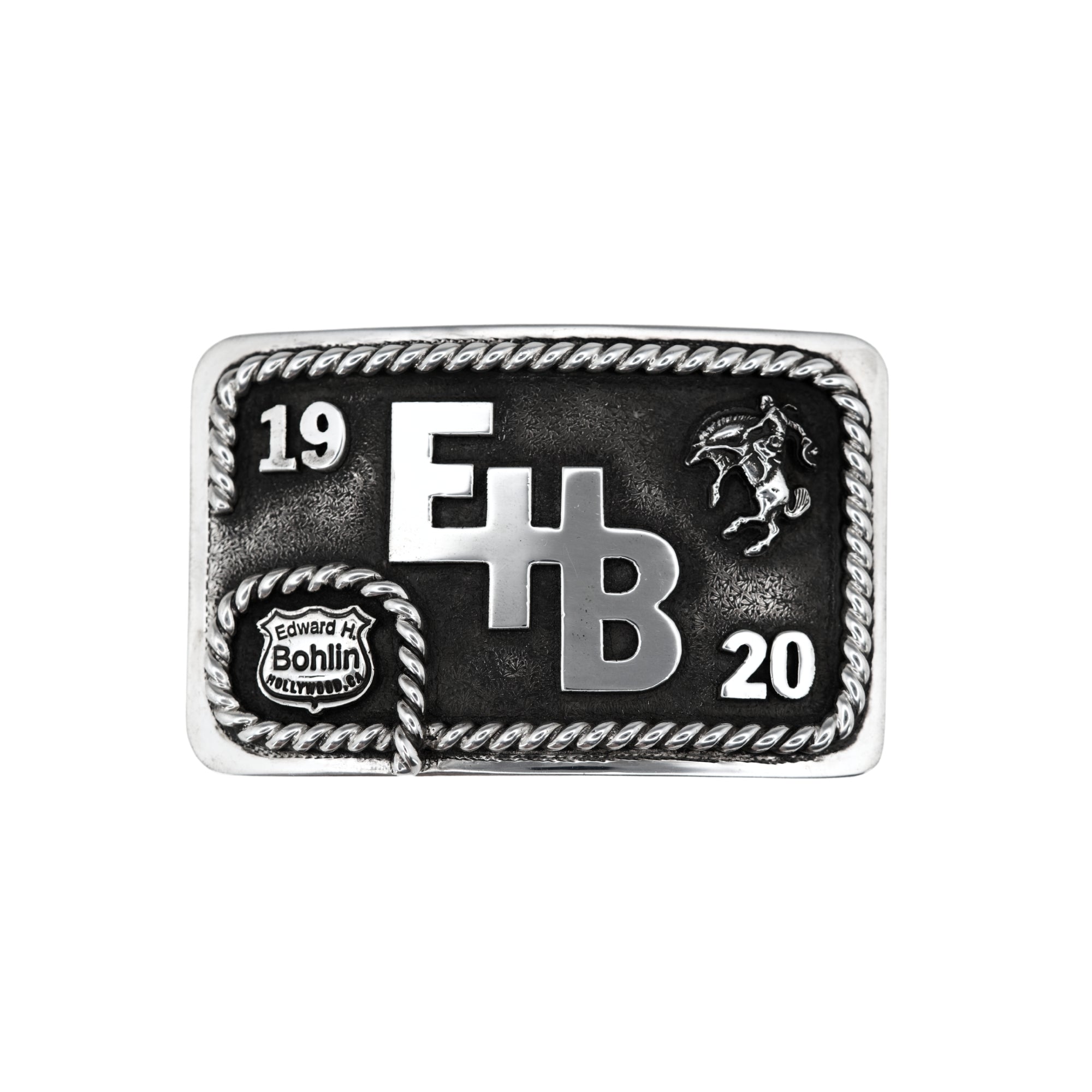 Brand buckle with 1920, EHB, and Bucking horse within a hand twisted rope edge. 