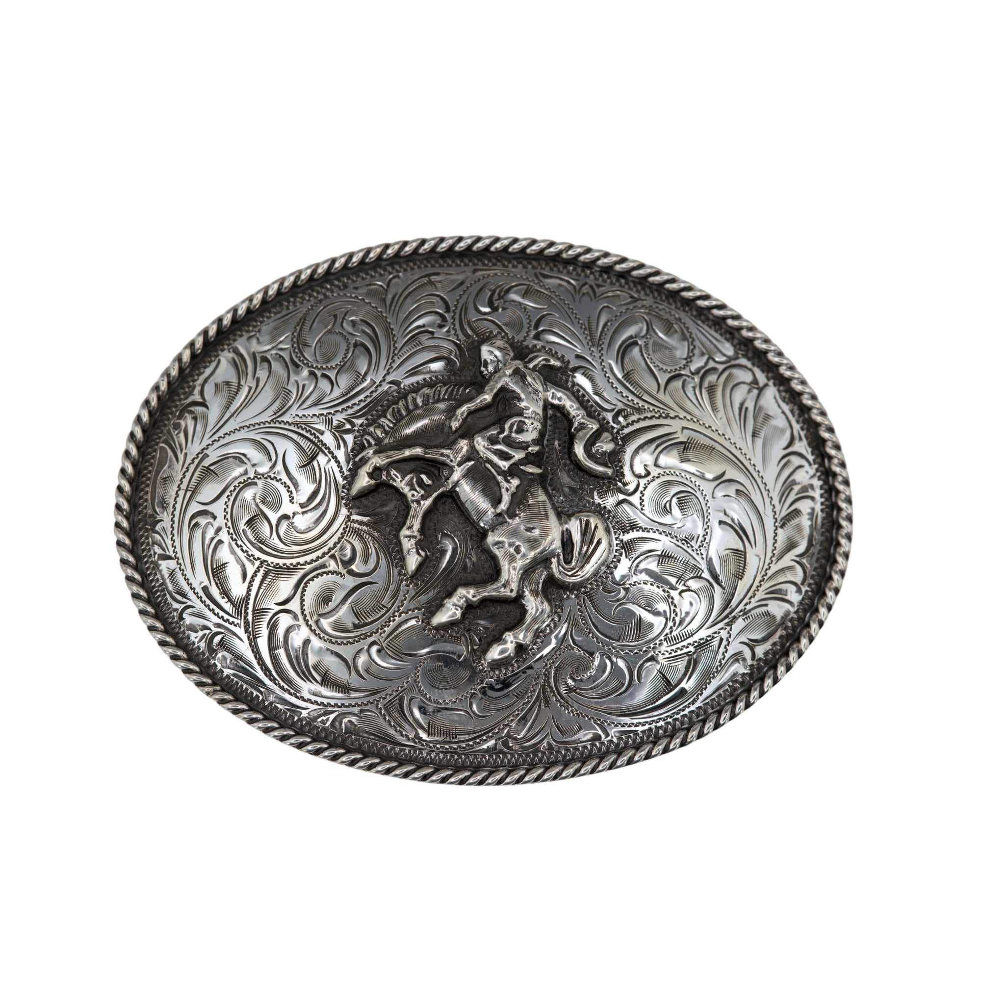 An oval silver belt buckle featuring a Bohlin Fred harmon bucking horse in sterling silver, surrounded by hand engraving and a hand twisted rope edge. 