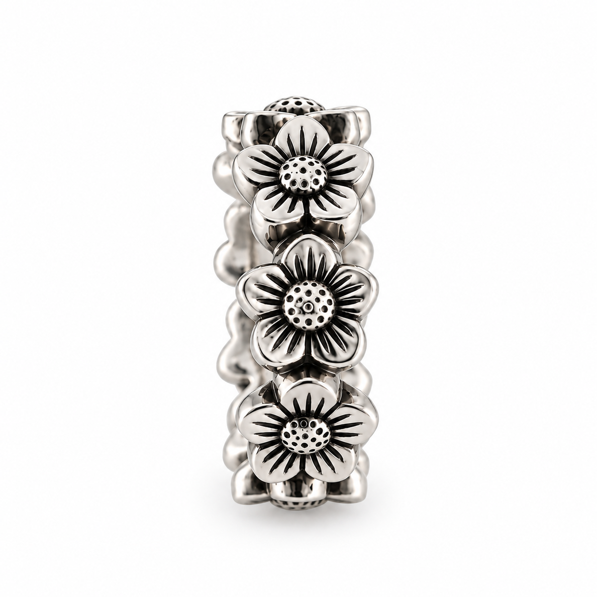 Front view of Bohlin Flower Crown Ring in sterling silver with repeating raised flowers